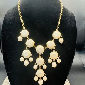 Gold And White Beaded Pendant Necklace